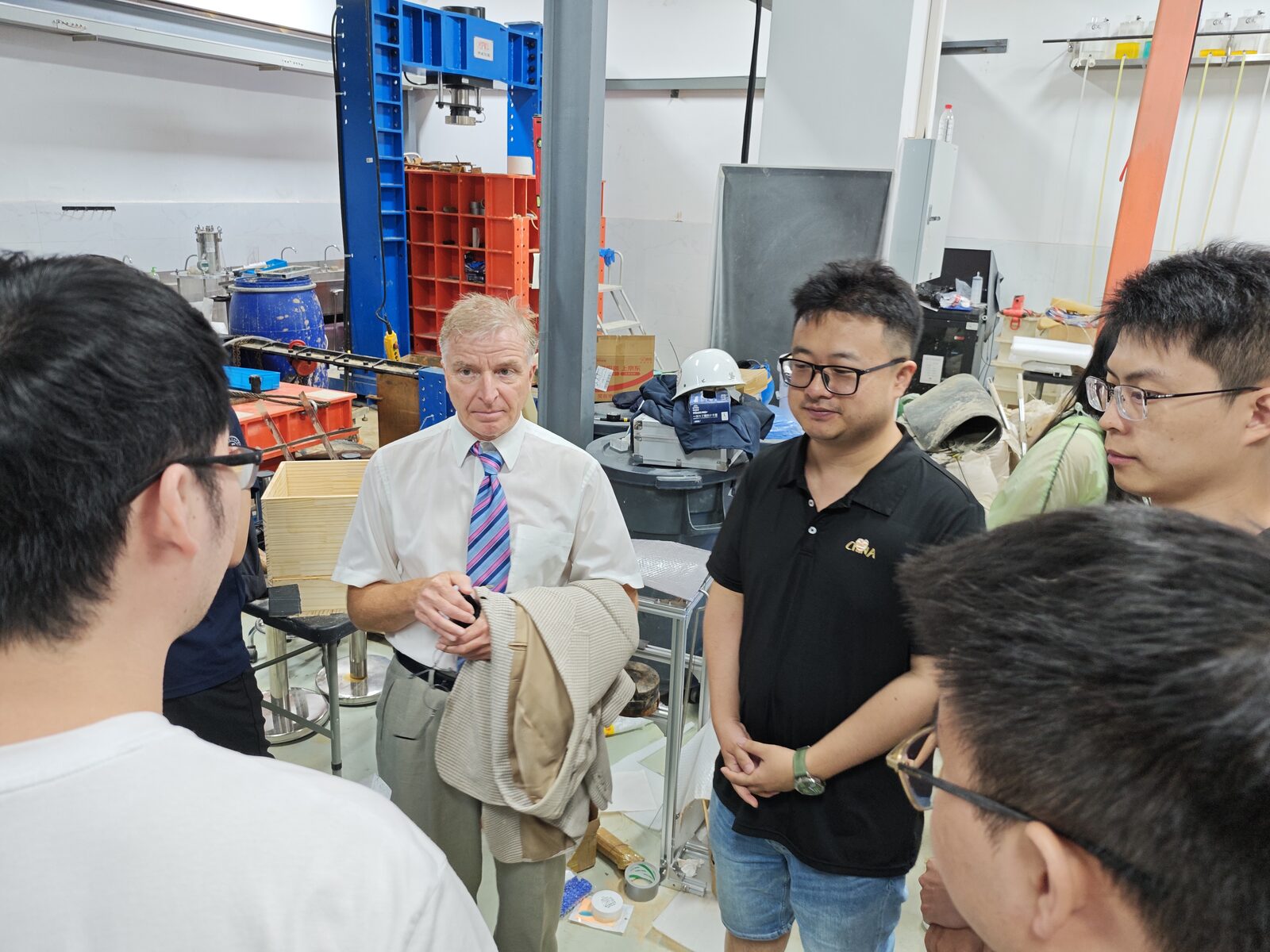Professor Markus Flury exchanging ideas with UNSAT Lab members