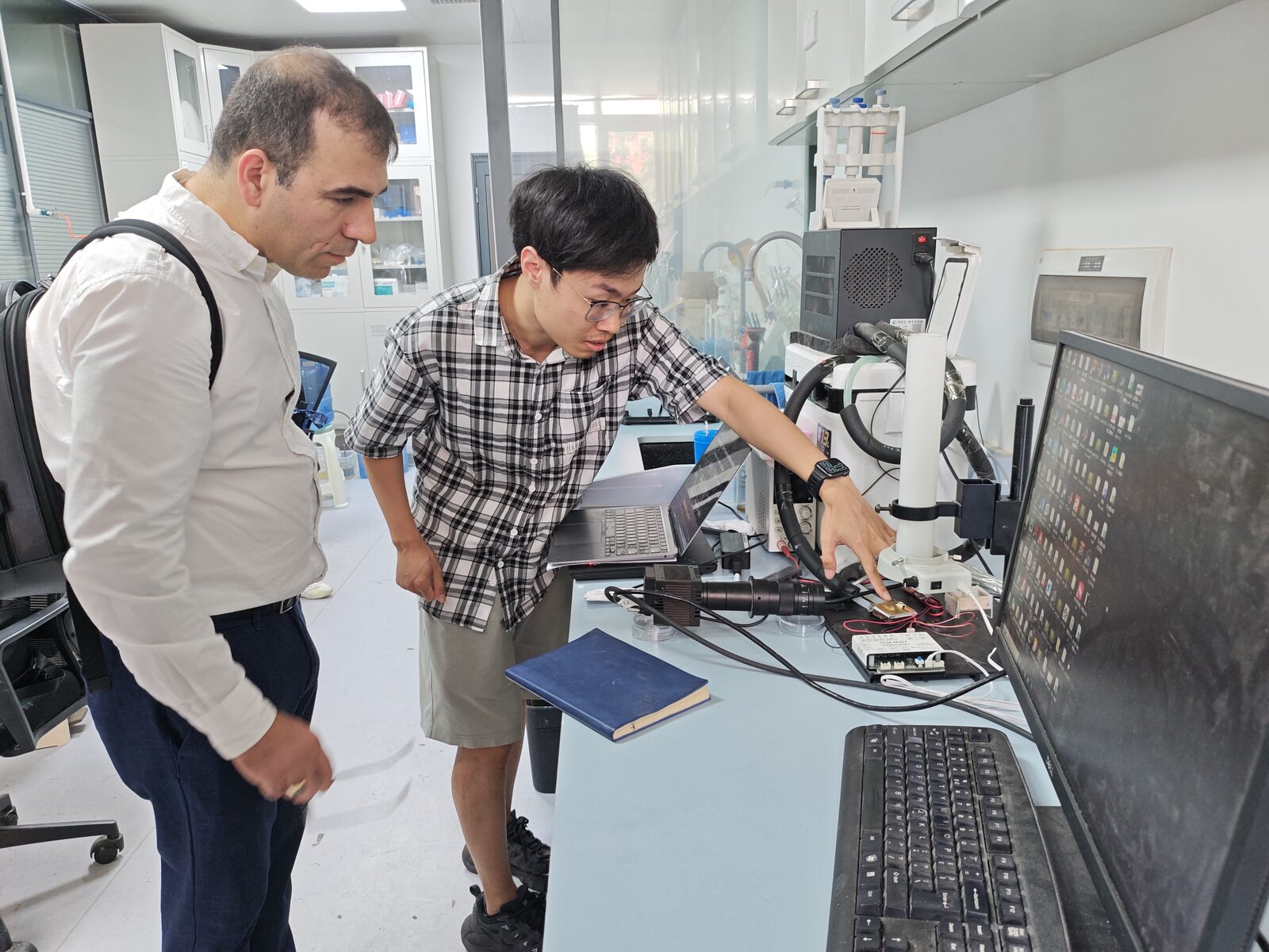 Professor Nima Shokri touring laboratory facilities